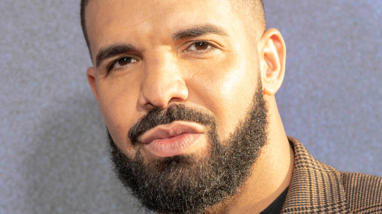 Drake with serious facial expression