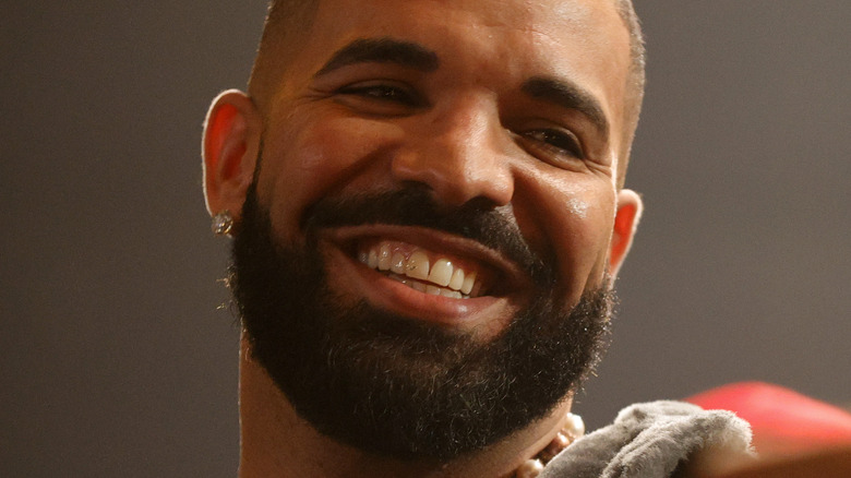 Drake smiling