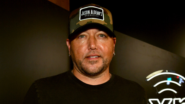 Jason Aldean wearing a hat