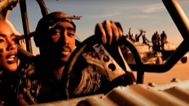 Tupac drives a car in the "California Love" music video