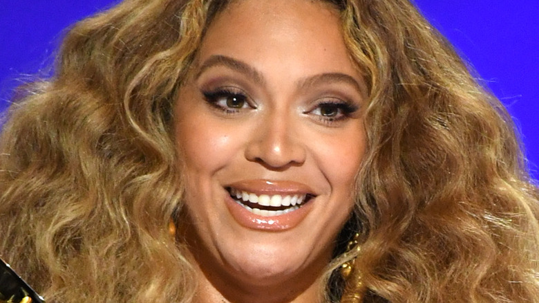 Beyoncé accepts a Grammy award in 2021