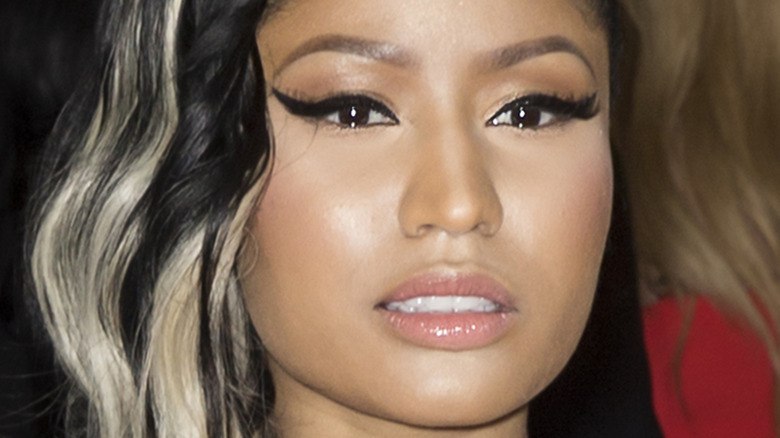 Nicki Minaj with a neutral expression
