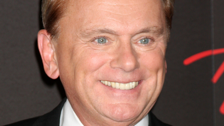 Pat Sajak smiling big