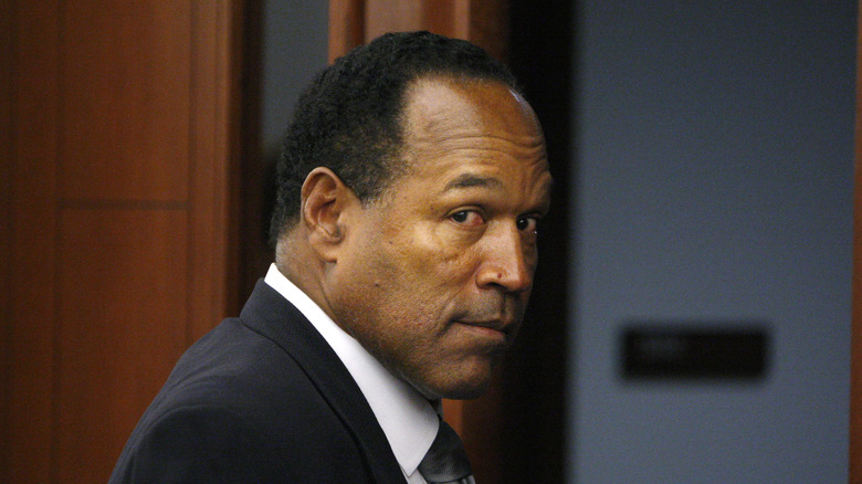 O.J. Simpson walking out of a courtroom