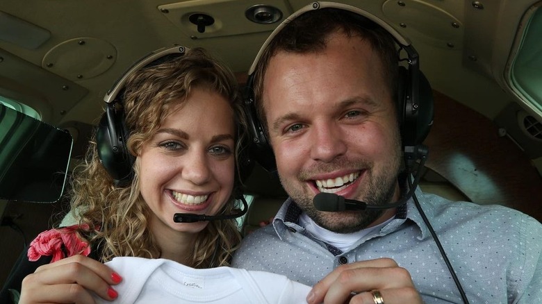 Abbie and John David Duggar inside plane