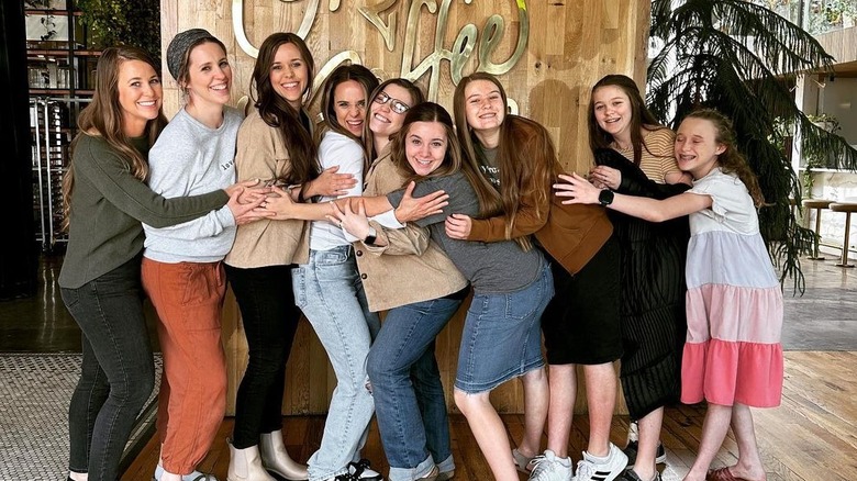 The Duggar sisters hugging