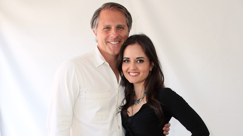 Danica Mckellar posing with her husband Scott Sveslosky