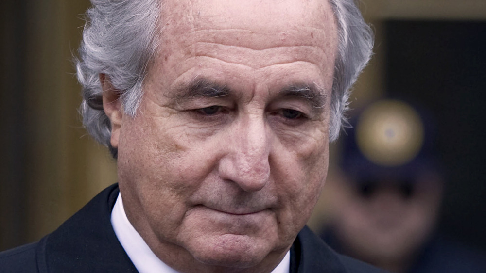 Bernie Madoff walking after arrest