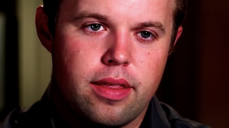 John David Duggar looking to the side with mouth open