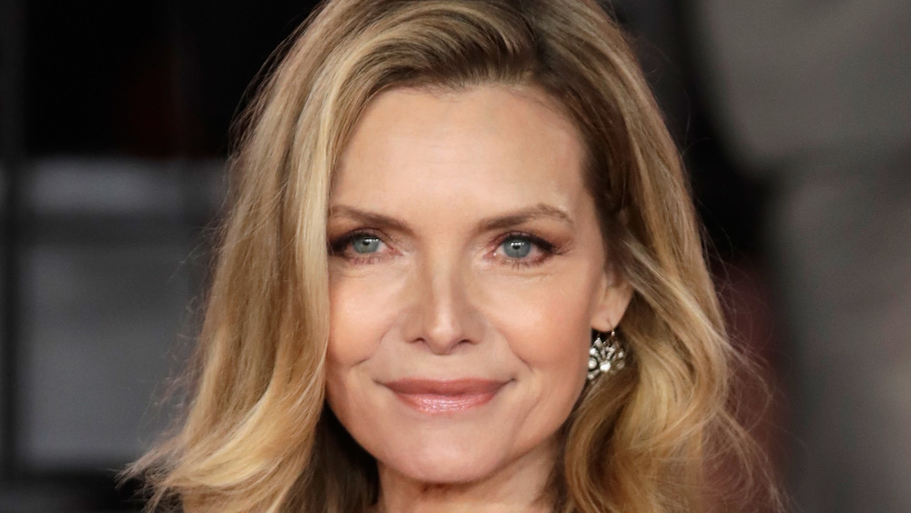 Michelle Pfeiffer posing on red carpet