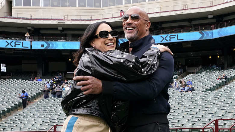 Dany Garcia and Dwayne Johnson hugging