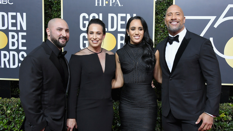 Dwayne Johnson and his ex-wive with spouses