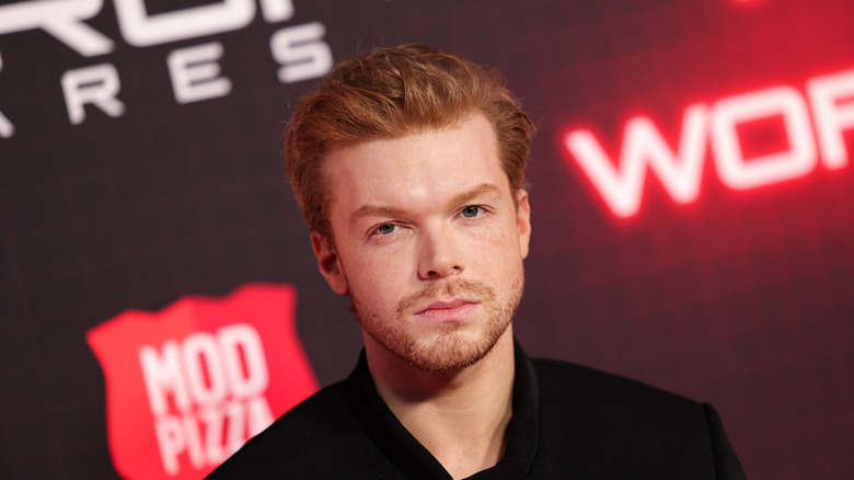 Cameron Monaghan staring ahead in black shirt