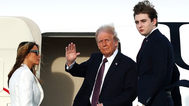 Melania Trump, Donald Trump, and Barron Trump board a US Air Force Aircraft in West Palm Beach, FL (2025)