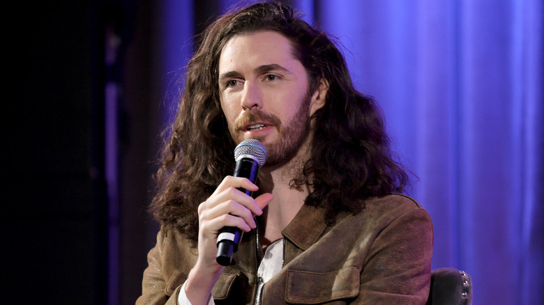 Hozier speaking on stage