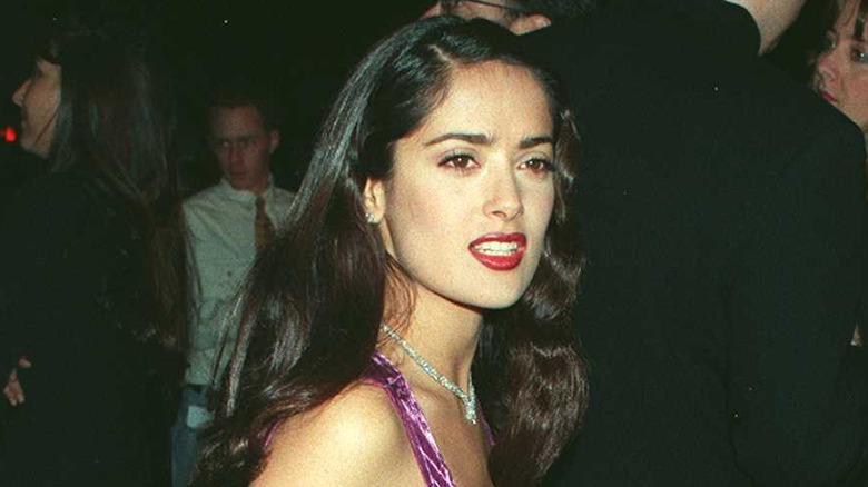 young Salma Hayek in red lipstick