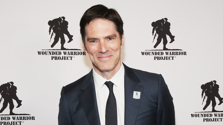 Thomas Gibson smirking