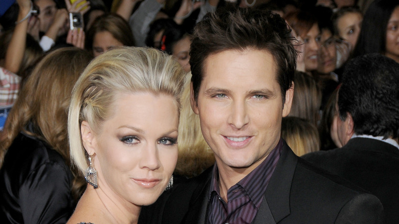 Jennie Garth and Peter Facinelli stand together