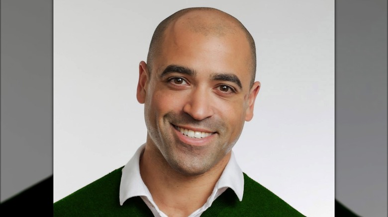 Ian Thomson smiling in a headshot