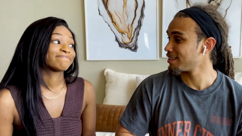 Uche Nwosu joking with Clinton Moxam in an interview