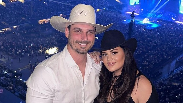 Alexa Alfia and Brennon Lemieux pose together at a concert