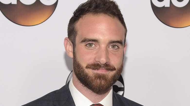 Joshua Sasse smiling