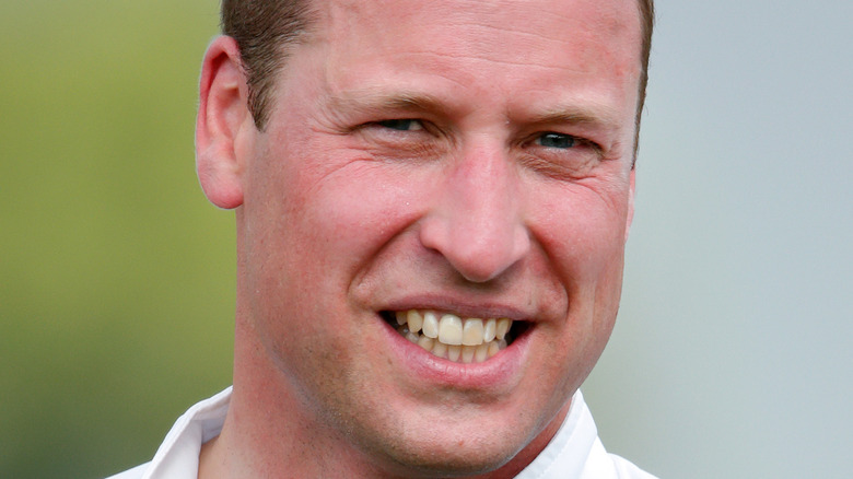 Prince William, smiling, 2021 photo playing Polo