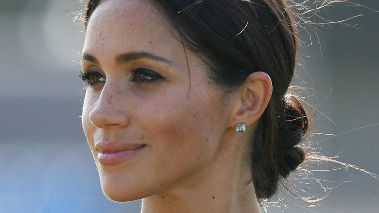 Meghan Markle looking off into the distance
