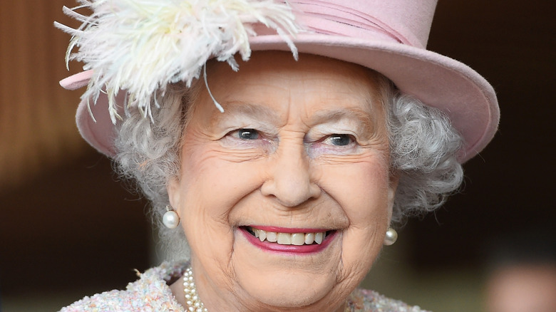Queen Elizabeth II visits West Sussex 2017 in pink hat