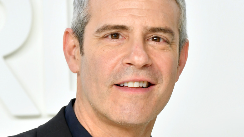 Andy Cohen attending fashion show