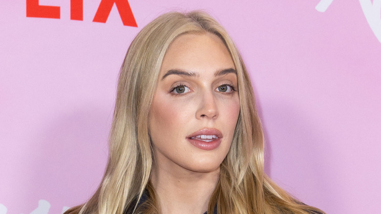 Alex Cooper on red carpet