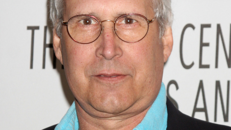 Chevy Chase smirking 