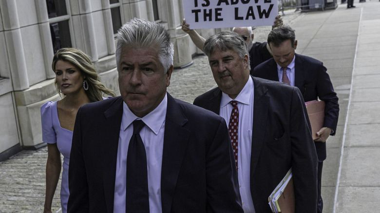 The legal team of former US President Donald Trump, led by M. Evan Corcoran (C), along with Lindsey Halligan (L), James Trusty (Center-R), and Christ Kise (R) arriving at the Brooklyn Federal Courthouse