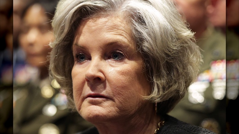 White House Chief of Staff Susie Wiles listening as U.S. President Donald Trump speaks to senior military leaders at Marine Corps Base Quantico