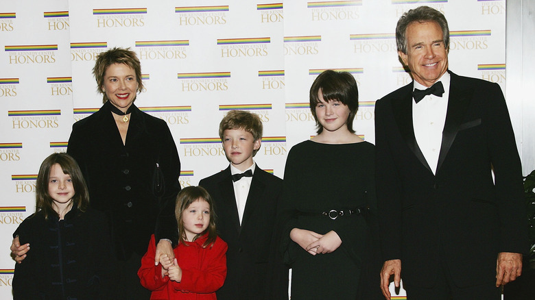 Warren Beatty and Annette Bening posing with their four children