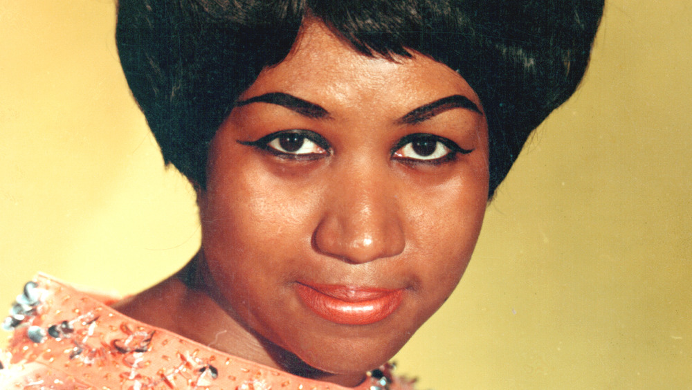 Aretha Franklin smiling for a promotional photo