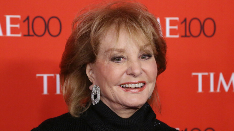 Barbara Walters smiling in black turtleneck