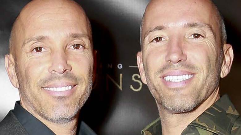 Jason Oppenheim and Brett Oppenheim smiling