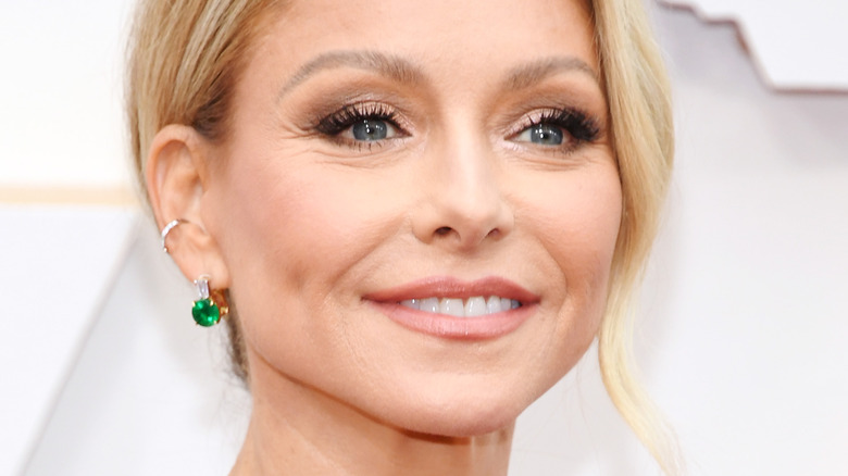 Kelly Ripa green earrings with updo