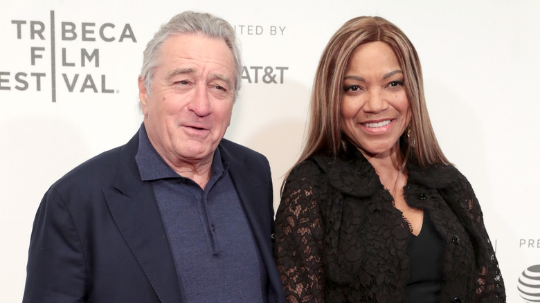 Robert De Niro and Grace Hightower pose for a photo. 