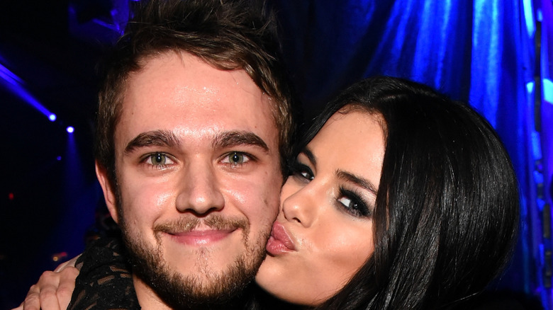 Selena Gomez kissing Zedd on the cheek