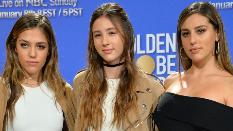 Sistine Stallone, Scarlet Stallone, and Sophia Stallone posing