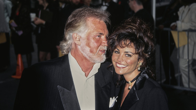 Kenny Rogers with his fifth and final wife Wanda Miller at the AMAs
