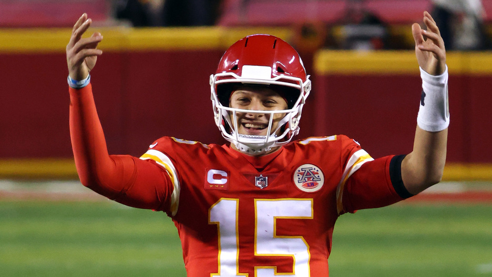Patrick Mahomes with raised arms