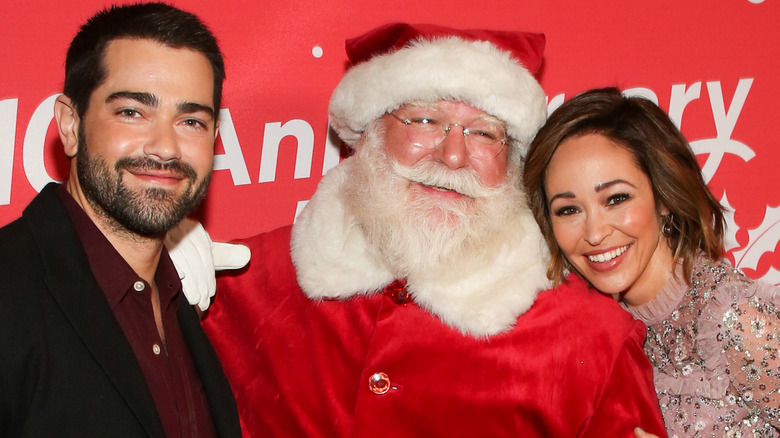 Jesse Metcalfe and Autumn Reese pose with Santa