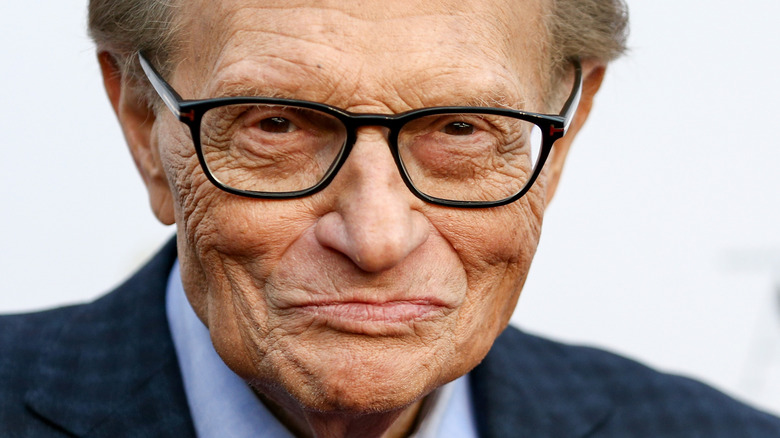 Larry King smiling