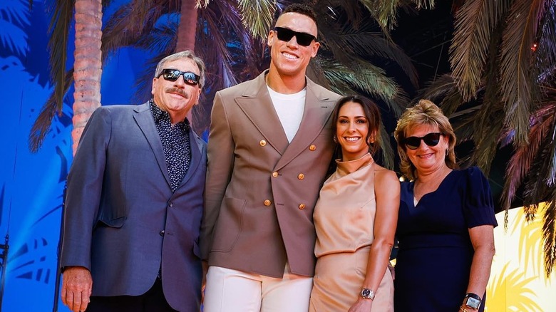 Aaron Judge and Samantha Bracksieck posing with group