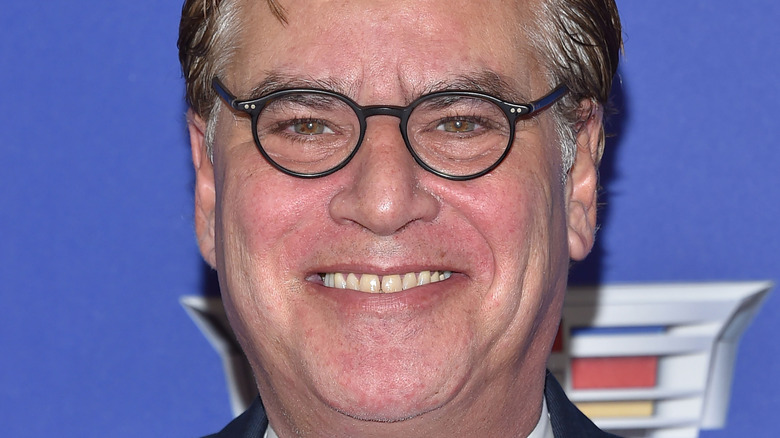 aaron sorkin in tiny glasses