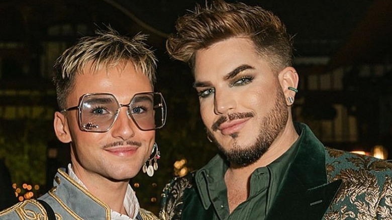 Oliver Gliese big glasses and Adam Lambert smiling 