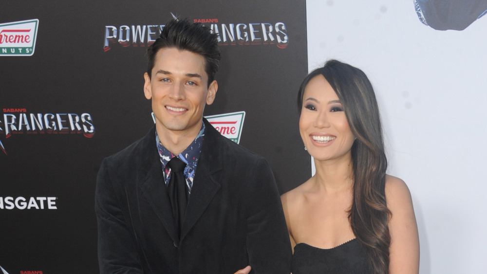 Andrew Gray at the Power Rangers premiere with Kelly Mi Li